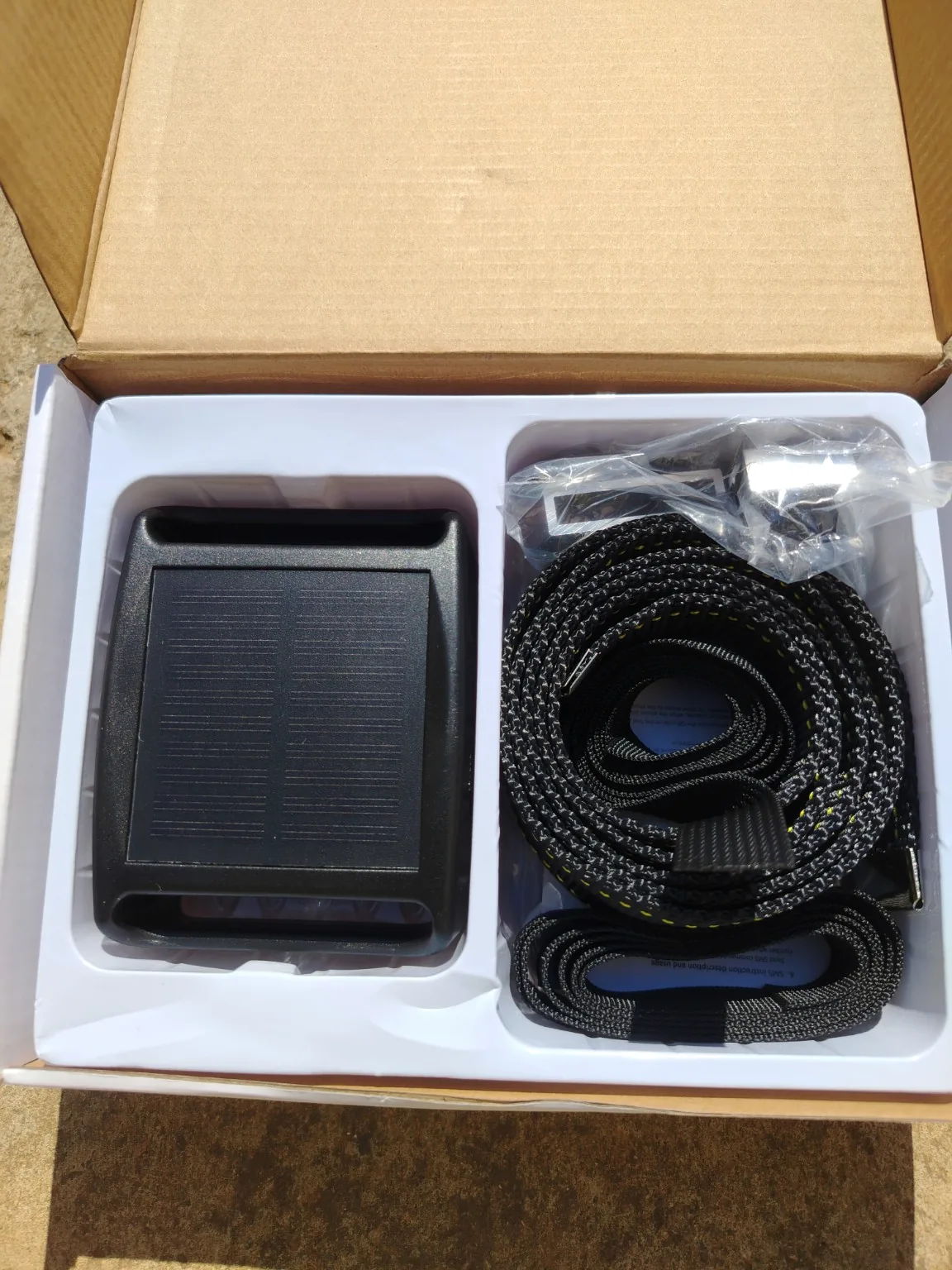 Complete VelaTrack Q19 livestock tracker package with solar tracker, collar straps and accessories